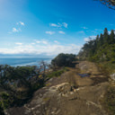 A view of the Coast Trail along the challenging section that passes over many rocks between Alldridge Point and Beechey Head in East Sooke Park.